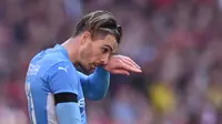 Jack Grealish memiliki gaya rambut yang unik sehingga sempat ditarik-tarik bek Atletico Madrid, Savic (AFP)