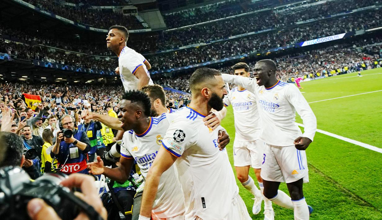 <p>Real Madrid sukses memastikan diri lolos ke Final Liga Champions 2021/2022.Los Blancos meraih epic comeback melawan Manchester City dengan menundukkan wakil Inggris itu dengan skor 3-1. (AP/Manu Fernandez)</p>