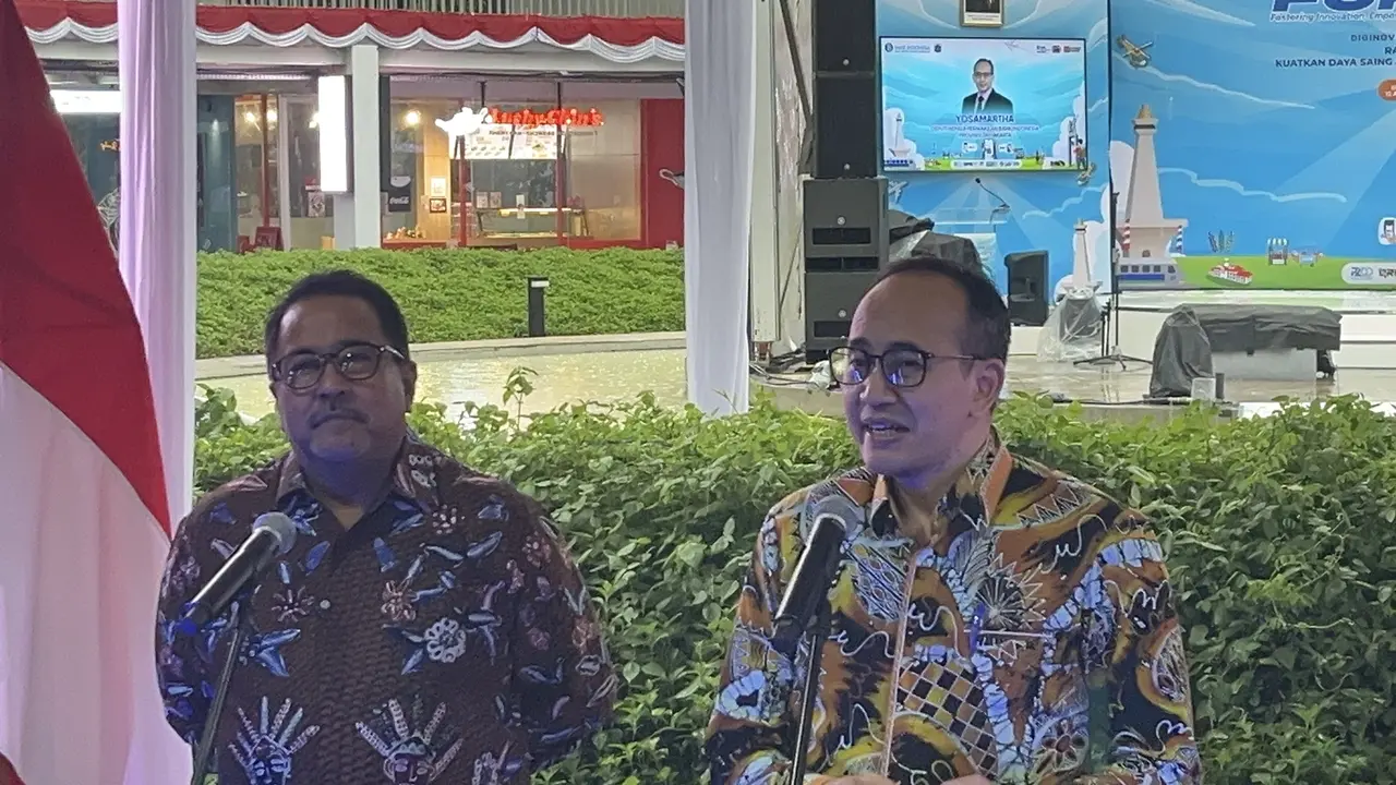 Deputi Kepala Perwakilan Bank Indonesia DKI Jakarta, Yosamartha (kanan) bersama Wakil Gubernur Jakarta Rano Karno (kiri)
