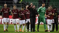 Gennaro Gattuso berteriak merayakan kemenangan usai mengalahkan Sampdoria 1-0 pada lanjutan Liga Serie A Italia di stadion San Siro (18/2). Berkat hasil positif tersebut, Milan sukses naik ke peringkat ketujuh klasemen. (AFP Photo/Miguel Medina)