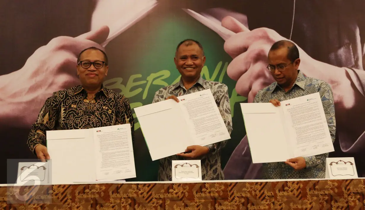 BPJS Ketenagakerjaan menandatangani Komitmen Anti Korupsi bersama KPK, Jakarta, Rabu (14/9). BPJSTK mempertegas komitmennya terkait gerakan Anti Korupsi dengan menerapkan tata kelola perusahaan yang baik dan bersih. (Liputan6.com/Helmi Afandi)