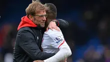 Manajer Liverpool, Jurgen Klopp (kiri), dan striker Christian Benteke (kanan). (AFP/Glyn Kirk)