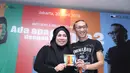 Delapan lagu dipersembahkan bagi penikmat musik dalam album tersebut. I'm Still Loving You, Bimbang, Perjalanan, Ratusan Purnama, Jangan Ajak-Ajak Dia, Sayang Mau Apa?, Terlalu Cinta, dan Suara Hati Seorang Kekasih. (Andy Masela/Bintang.com)