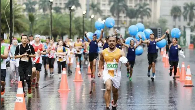[Bintang] 10 Foto Para Pelari Saat Meriahkan Jakarta Marathon