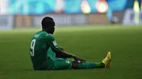 Cheick Tiote saat membela Pantai Gading di Piala Dunia 2014. Kabar terbaru, Tiote meninggal dunia karena serangan jantung di Beijing pada Senin (5/6/2017). (AFP/Eitan Abramovich)