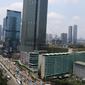 Pemandangan gedung bertingkat di kawasan Bundaran HI, Jakarta, Kamis (14/3). Kondisi ekonomi Indonesia dinilai relatif baik dari negara-negara besar lain di Asean. (Liputan6.com/Angga Yuniar)
