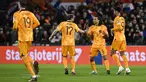Bek Belanda, Nathan Ake (kedua kanan) berselebrasi dengan rekan setimnya setelah mencetak gol ke gawang Gibraltar pada pertandingan kualifikasi grup B UEFA Euro 2024 di Stadion Feijenoord 'De Kuip', di Rotterdam, Selasa, 28 Maret 2023. (AFP/John Thys)