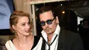 Kondisi Johnny Depp dipengaruhi oleh semua tuduhan tentang penganiayaan yang menimpa Amber Heard. Tak hanya itu, Amber kembali menuntut ganti rugi yang cukup besar. (AFP/Bintang.com)