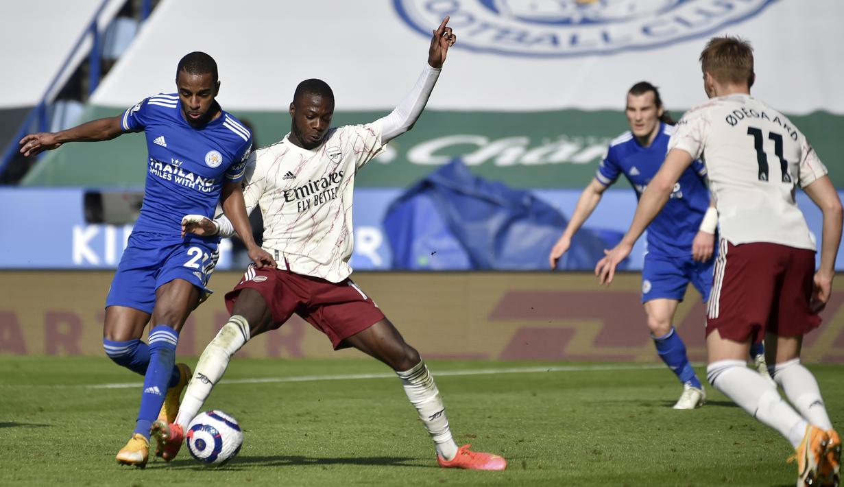 Arsenal seiring waktu tampil makin percaya diri dan bisa menyeimbangkan permainan Leicester City. Terbukti, gol sundulan David Luiz menyeimbangkan kedudukan menjadi 1-1. (Foto: AP/Pool/Rui Vieira)