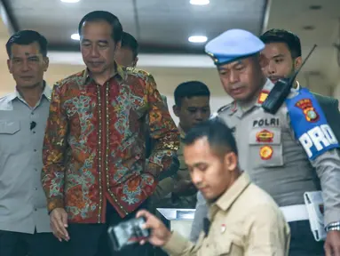 Presiden ke-7 Republik Indonesia, Joko Widodo (Jokowi) usai membuat pelaporan soal tuduhan ijazah palsu di Mapolda Metro Jaya, Jakarta, Rabu (30/4/2025). (merdeka.com/Arie Basuki)