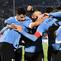 Gelandang Uruguay Federico Valverde (tengah) berselebrasi dengan rekan setimya setelah mencetak gol ke gawang Chile dalam Kualifikasi Piala Dunia 2026 zona CONMEBOL di Estadio Centenario, Sabtu (9/9/2023) pagi WIB. (Photo by Pablo PORCIUNCULA / AFP)
