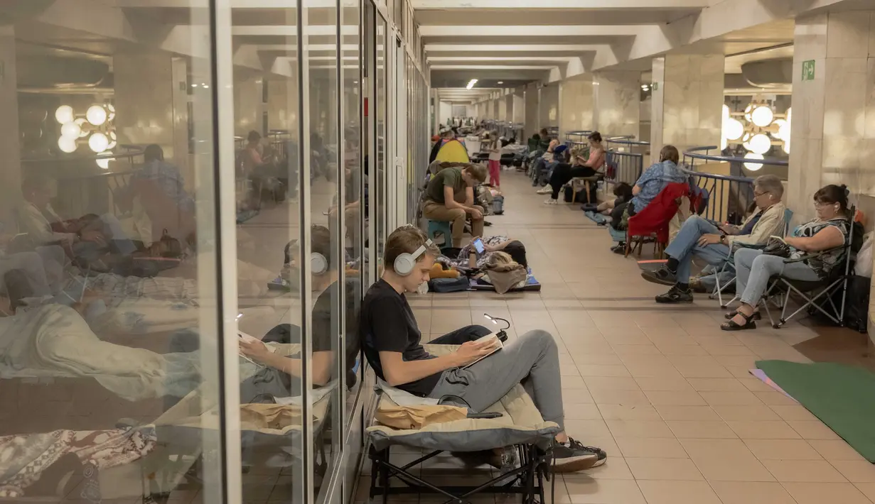 Gedung Putih disebut-sebut telah membahas rencana pertemuan trilateral antara Zelensky, Putin, dan Trump, meski Kremlin masih menahan diri. (Roman PILIPEY/AFP)