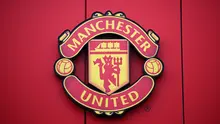 Logo Manchester United atau MU di Stadion Old Trafford. (Oli SCARFF / AFP)