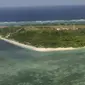 Pulau Pag-asa, bagian dari gugus kepulauan Spratly di Laut China Selatan. Gugus kepulauan Spratly menjadi salah satu lokasi yang kerap dimiliterisasi oleh China (AP Photo/Rolex Dela Pena, Pool, File)