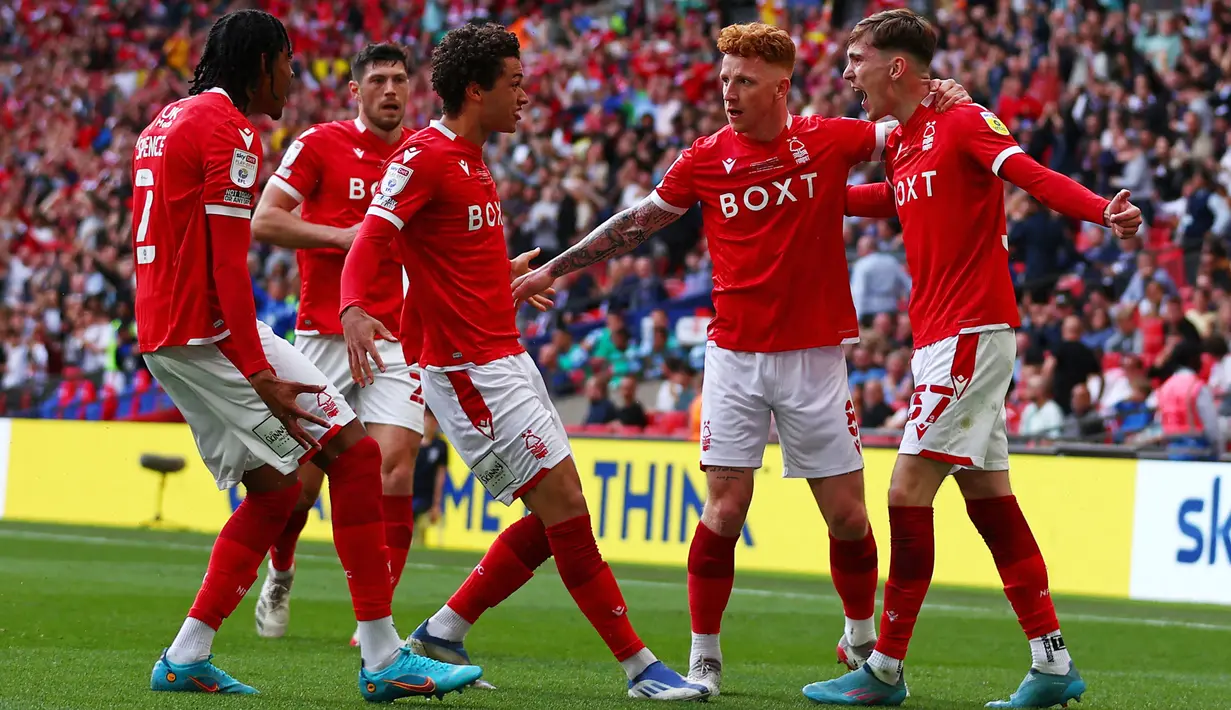 Anak asuh Steve Cooper itu memastikan tiket promosi usai menundukkan Huddersfield Town dengan skor 1-0 dalam duel final play-off Championship. (AFP/Adrian Dennis)