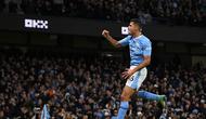 Gelandang Man City, Rodri, merayakan gol yang dicetaknya ke gawang Sheffield United dalam laga pekan ke-20 Liga Inggris 2023/2024 di Etihad Stadium, Sabtu (30/12/2023) malam WIB. Man City menang 2-0 dalam laga ini. (Oli SCARFF / AFP)