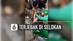 BOCAH PEREMPUAN TERJEBAK DI SELOKAN, PENYELAMATAN DIBANTU DRIVER OJOL