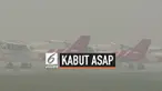 Kabut asap menyelimuti bandara Tijilik Riwut, Kalimantan Tengah. Aktifitas penerbangan lumpuh karena aaya kabut asap.