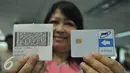 KA Program sistem pemilu elektronik, Andrari Grahita menunjukan struk audit dan kartu untuk voting di gedung BPPT, Jakarta, Rabu (29/7/2015). E-voting dan KTP el dimanfaatkan untuk mendukung KPU pada pilkada serentak. (Liputan6.com/Herman Zakharia)