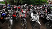 12 Tempat parkir yang disediakan tidak bisa disiapkan secara gratis, Jakarta, Kamis (4/12/2014). (Liputan6.com/Johan Tallo)