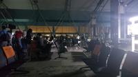 Sebuah foto yang menggambarkan suasana gelap di ruang tunggu penumpang Terminal 3 Bandara Internasional Soekarno Hatta, mendadak viral di media sosial. (Liputan6.com/Pramita Tristiawati)