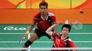Ganda campuran Indonesia, Tontowi Ahmad/Liliyana Natsir, mengalahkan pasangan Malaysia, Chan Peng Soon/Goh Liu Ying, dua gim langsung 21-14 dan 21-12. (Reuters/Marcelo Del Pozo)