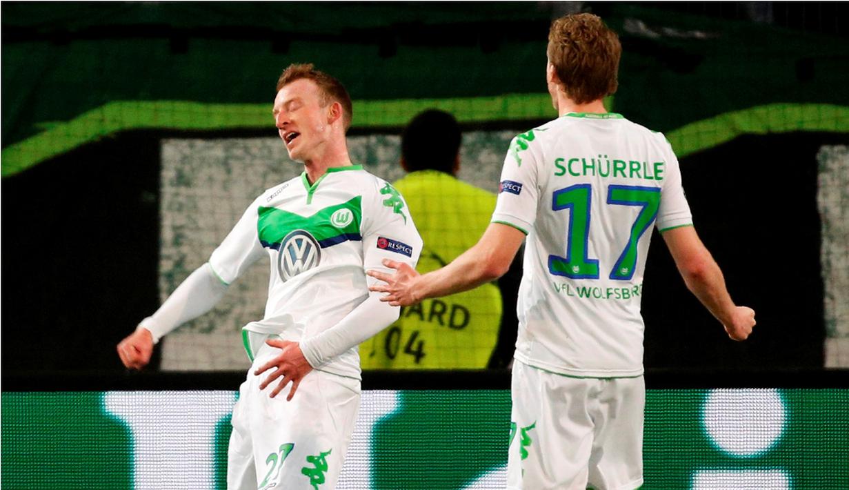 Ekspresi pemain Wolfsburg, Maximilian Arnold, setelah mencetak gol ke gawang Real Madrid pada leg pertama perempat final Liga Champions di Volkswagen Arena, Wolfsburg, Kamis (7/4/2016) dini hari WIB. (AFP/Odd Andersen)