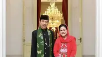 Ibu Iriana mengenakan kebaya encim warna merah dengan aksen bordiran bunga dari Roemah Kebaya Vielga, dipadukan dengan kain batik merah. [Instagram/@jokowi]