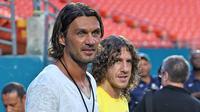 Charles Puyol bersama Paolo Maldini (Marca)