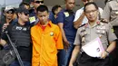 Kapolda Metro Jaya, Irjen Tito Karnavian (kanan) saat rilis penangkapan pelaku pembunuhan warga negara Jepang di halaman Mapolda Jakarta, Jumat (11/9/2015). (Liputan6.com/Yoppy Renato)
