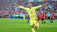 Penyerang Timnas Spanyol, Ferran Torres, merayakan gol yang dicetaknya ke gawang Albania dalam laga terakhir Grup B Euro 2024 di Dusseldorf Arena, Selasa (25/6/2024) dini hari WIB. Spanyol menang 1-0 dan lolos ke 16 besar Euro 2024 dengan catatan selalu menang dan tanpa kebobolan.
(PATRICIA DE MELO MOREIRA / AFP)