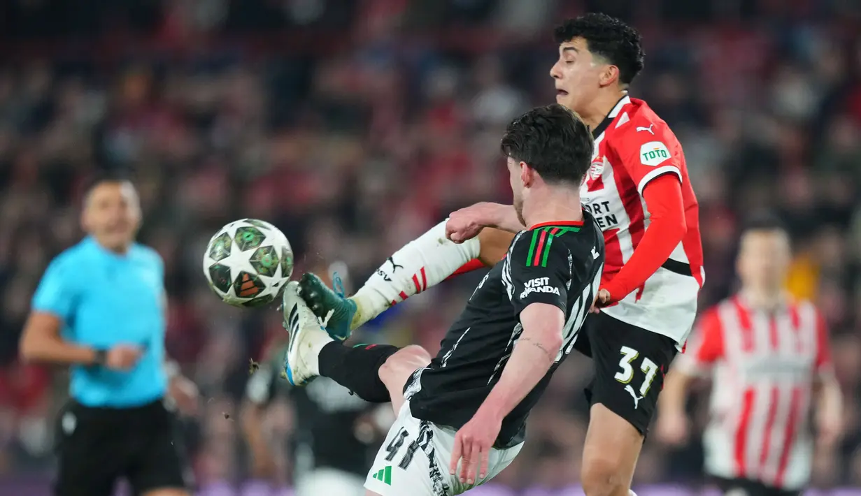 Arsenal mencatatkan kemenangan besar 7-1 atas PSV Eindhoven. Ini menjadi kemenangan terbesar dalam sejarah babak 16 besar Liga Champions. (AP Photo/Peter Dejong)