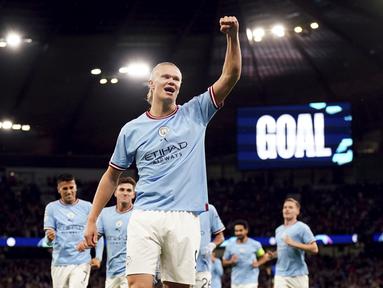 Penyerang Manchester City Erling Haaland berselebrasi setelah mencetak gol ke gawang Copenhagen dalam matchday ketiga Grup G Liga Champions 2022/2023 di Etihad Stadium, Kamis (6/10/2022) dini hari WIB. Manchester City berpesta saat menjamu FC Copenhagen di Liga Champions. (Nick Potts/PA via AP)