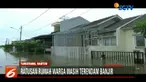 Aliran Kali Ledug meluap hingga permukiman diduga lantaran volume luar biasa akibat banjir kiriman dari Bogor, Jawa Barat.
