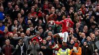 Pemain Manchester United Marcus Rashford melakukan selebrasi usai mencetak gol ke gawang Crystal Palace pada pertandingan sepak bola Liga Inggris di Stadion Old Trafford, Manchester, Inggris, 4 Februari 2023. Manchester United mengalahkan Crystal Palace dengan skor 2-1. (AP Photo/Dave Thompson)