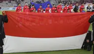 Pemain Timnas Indonesia U-23 sesaat sebelum bertanding melawan Brunei Darussalam pada laga Grup A ASEAN U-23 Championship Mandiri Cup 2025 (Piala AFF U-23 2025) di Stadion Utama Gelora Bung Karno, Jakarta, Selasa (15/7/2025). (Liputan6.com/Helmi Fithriansyah)