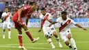Gelandang Denmark, Yurary Poulsen, berusaha melepaskan tendangan saat melawan Peru pada laga Grup C Piala Dunia di Mordovia Arena, Saransk, Sabtu (16/6/2018). Denmark menang 1-0 atas Peru. (AP/Martin Meissner)