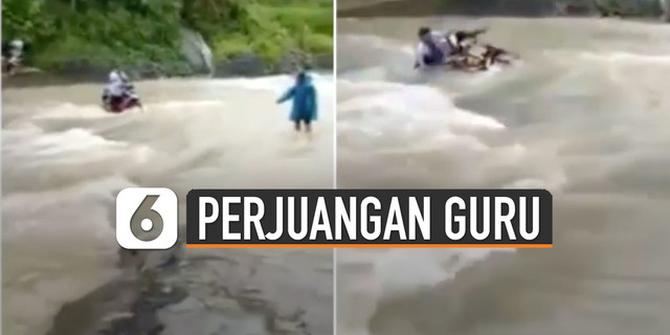 VIDEO: Perjuangan Guru Honorer Menerobos Sungai Hingga Tercebur