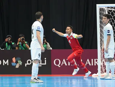 Kapten Timnas Futsal Indonesia, Mochammad Iqbal, melakukan selebrasi setelah mencetak gol ke gawang Kirgistan pada laga kedua Grup A Piala Asia Futsal 2026, Kamis (29/01/2026) malam WIB. (Bola.com/M Iqbal Ichsan)