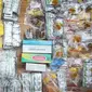 Ribuan obat keras dan kedaluwarsa hasil operasi di sejumlah apotek, toko, dan warung ditampilkan di Polda Metro Jaya, Jakarta, Rabu (20/9). Ditresnarkoba Polda Metro Jaya menyita puluhan ribu obat keras dan kadaluwarsa. (Liputan6.com/Immanuel Antonius)