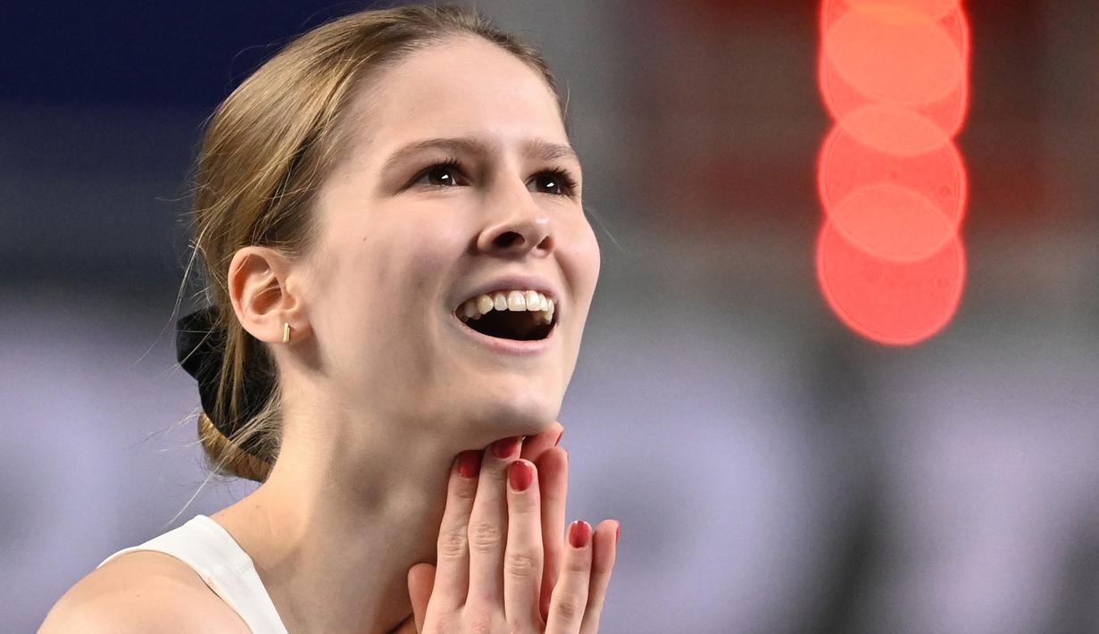 Ekspresi Pia Skrzyszowska dari Polandia saat perlombaan lari gawang 60m putri dalam Kejuaraan Atletik Indoor Eropa 2021 di Torun. (Foto: AFP/Sergei Gapon)