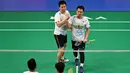 Di semifinal Australia Open 2024, Mohammad Ahsan/Hendra Setiawan akan bertemu dengan wakil Taiwan, Chen Zhi-ray/Lin Yu-chieh. (Saeed KHAN/AFP)