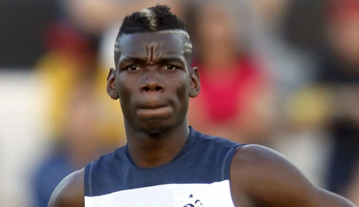 Paul Pogba memulai debut di Timnas senior Perancis pada 22 Maret 2013 lalu dan berhasil memberikan kemenangan 3-1 atas Georgia, (1/7/2014). (REUTERS/Charles Platiau)