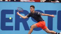 Petenis  Austria, Dominic Thiem, kandas di babak pertama, sedangkan David Ferrer harus bermain tiga set untuk ke babak kedua.