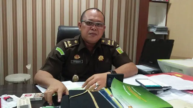 Kepala Seksi Penerangan Hukum Kejati Sulsel, Salahuddin menyatakan kasus dugaan korupsi yang jerat mantan Ketua PWI Sulsel sudah berstatus P21 (Lengkap) (Liputan6.com/ Eka Hakim)