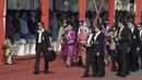 Ibu Negara Iriana Jokowi dan Ibu Mufidah Jusuf Kalla tiba menghadiri HUT ke-70 Polwan di Lapangan Monas, Jakarta, Senin (3/9). HUT ke-70 Polwan bertema "Polwan Promoter Siap Menyukseskan Agenda Kamtibmas 2018 - 2019". (Merdeka.com/Iqbal S. Nugroho)