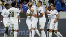 Penyerang  Al Ittihad, Karim Benzema berselebrasi dengan rekan setimnya setelah mencetak gol ke gawang Esperance dalam laga Arab Club Champions Cup 2023 di King Fahd Stadium, Jumat (28/7/2023). Al Ittihad menang atas Esperance dengan skor 2-1. (AFP Photo)