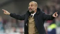 Pep Guardiola dinilai Thierry Henry bakal membuat gaya permainan Manchester City menjadi lebih baik. (Reuters/Carl Recine)