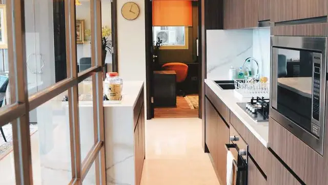 Desain Interior Apartemen Eklektik Modern yang Tampil Hangat dan Berkelas