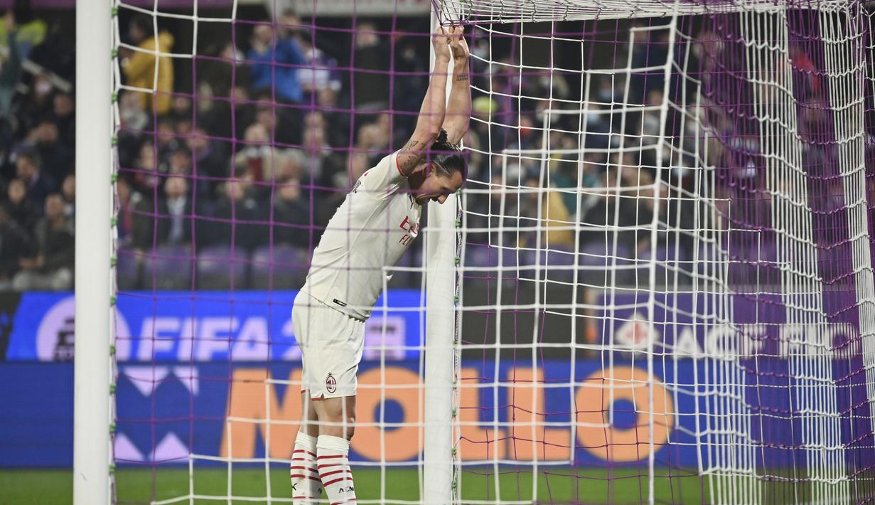 Kekalahan perdana Rossoneri di Liga Italia ini tak memengaruhi posisi mereka di klasemen. AC Milan tertahan di peringkat kedua dengan 32 angka. (AP/Massimo Paolone)